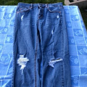 Skinny ripped blue jeans